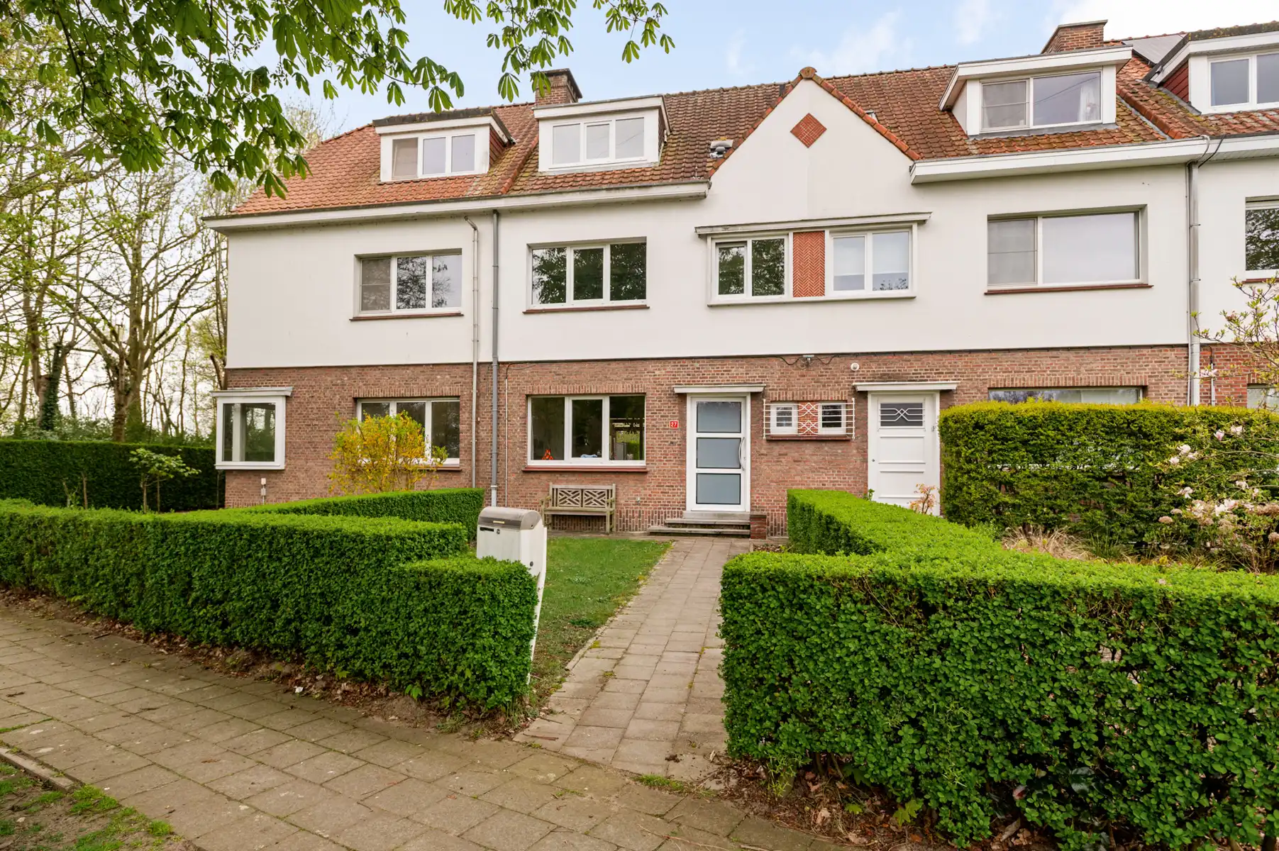 Instapklare gezinswoning in prachtige tuinwijk te Schelle foto {{pictureIndex}}