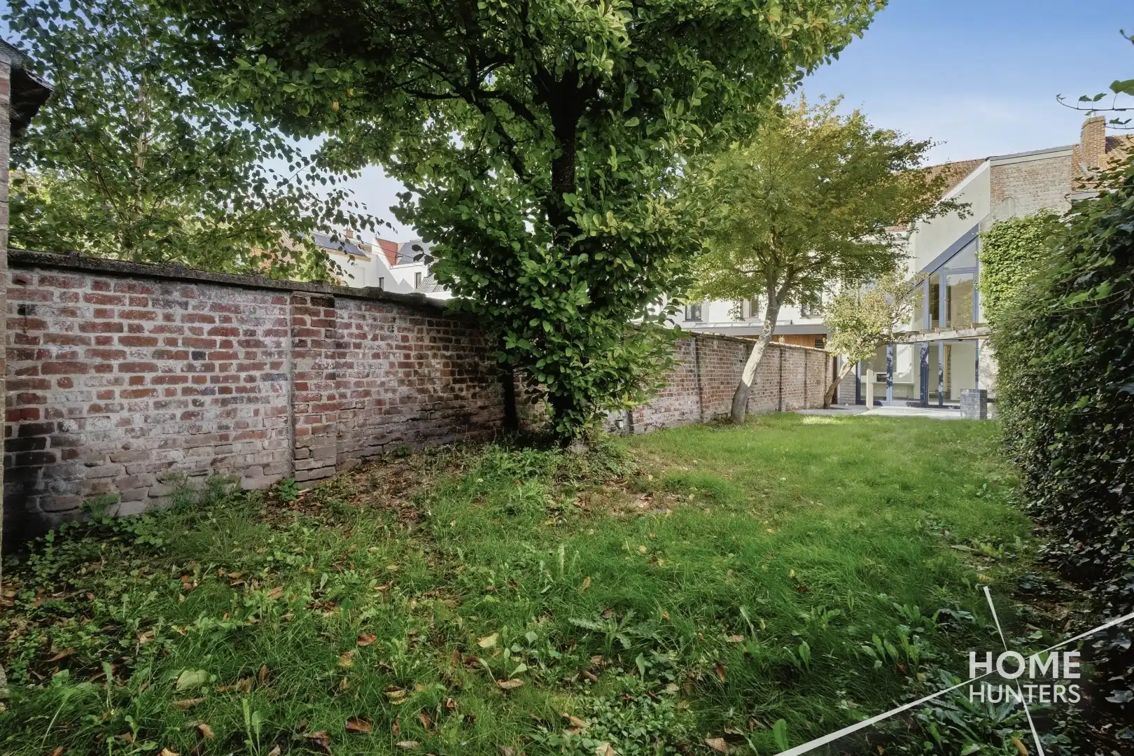 Ruime instapklare stadswoning met 3 slpks, tuin en EPC B foto 14