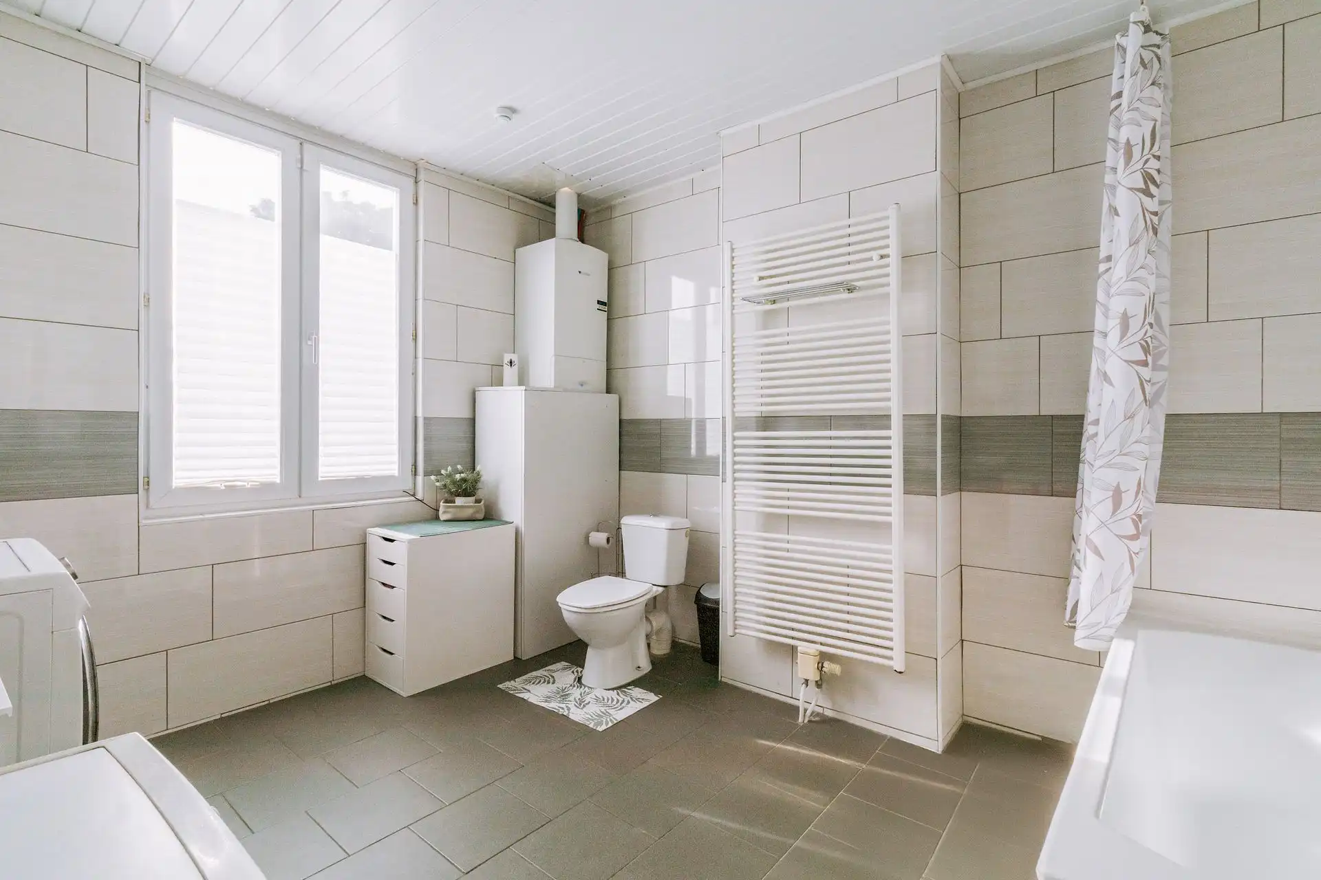 Ruime woning met 3 slpk, 2 parkeerplaatsen en buitenruimte foto 18
