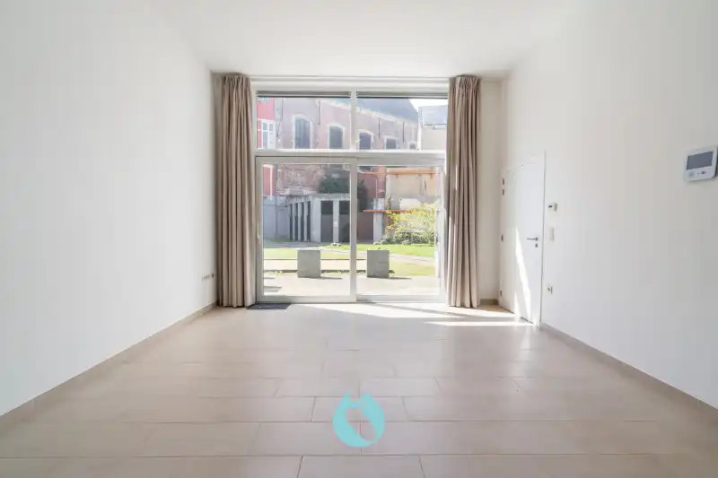 Gelijkvloerse serviceflat met privaat terras foto {{pictureIndex}}