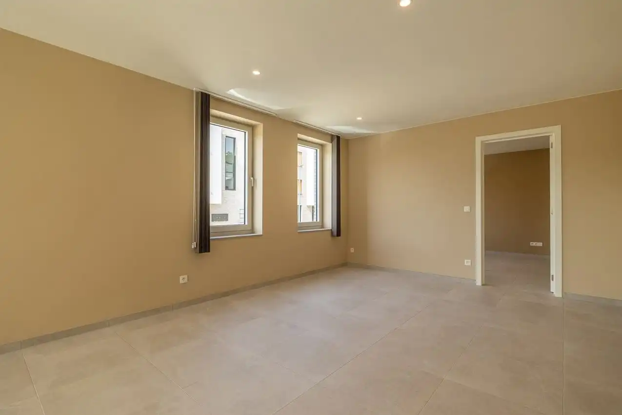Gelijkvloers app. met twee slaapkamers, zuidterras, garage nabij bossen foto 12