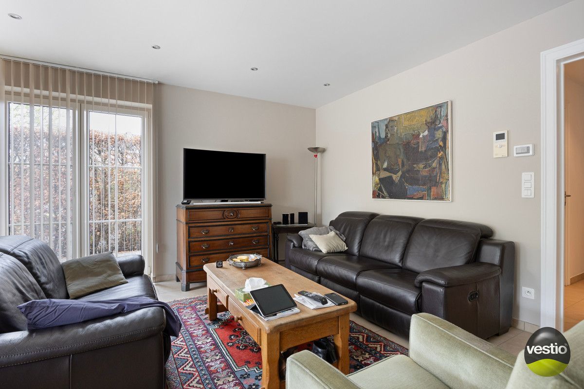 OPBRENGSTEIGENDOM VAN VERHUURD GELIJKVLOERS APPARTMENT MET 1 SLP NABIJ CENTRUM HOESELT. foto 6