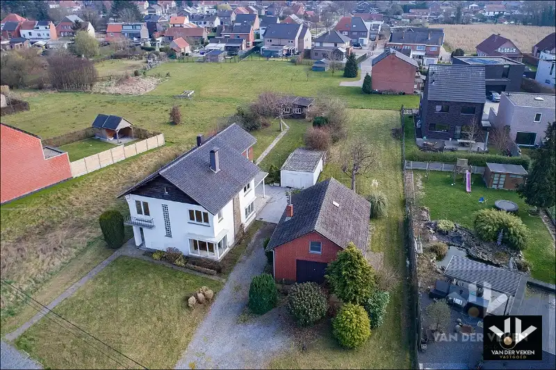 Bouwgrond +- 10 aren (huidige woning wordt afgebroken door de huidige eigenaars) voor open bebouwing op een rustige, maar zeer goed bereikbare locatie in het charmante Diepenbeek foto 5