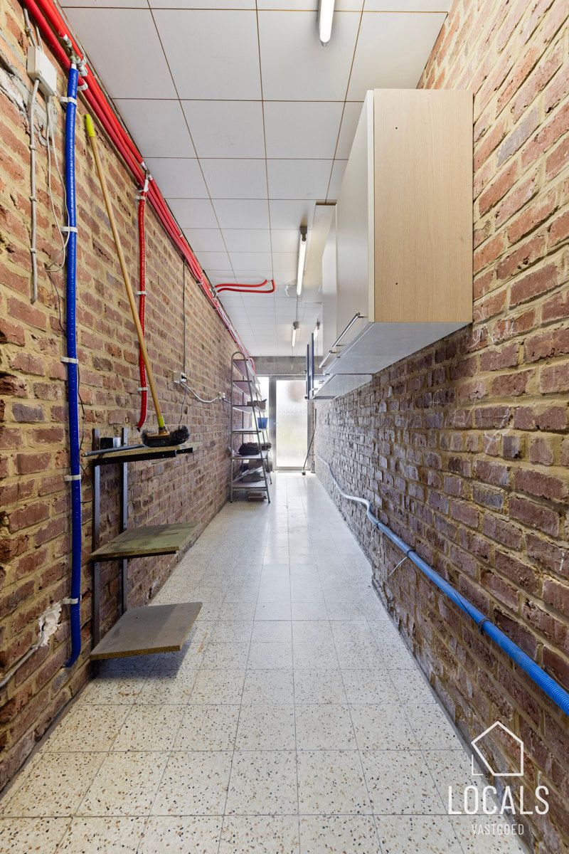 Handelspand met woonst, tuin en garage in centrum Ninove foto 17