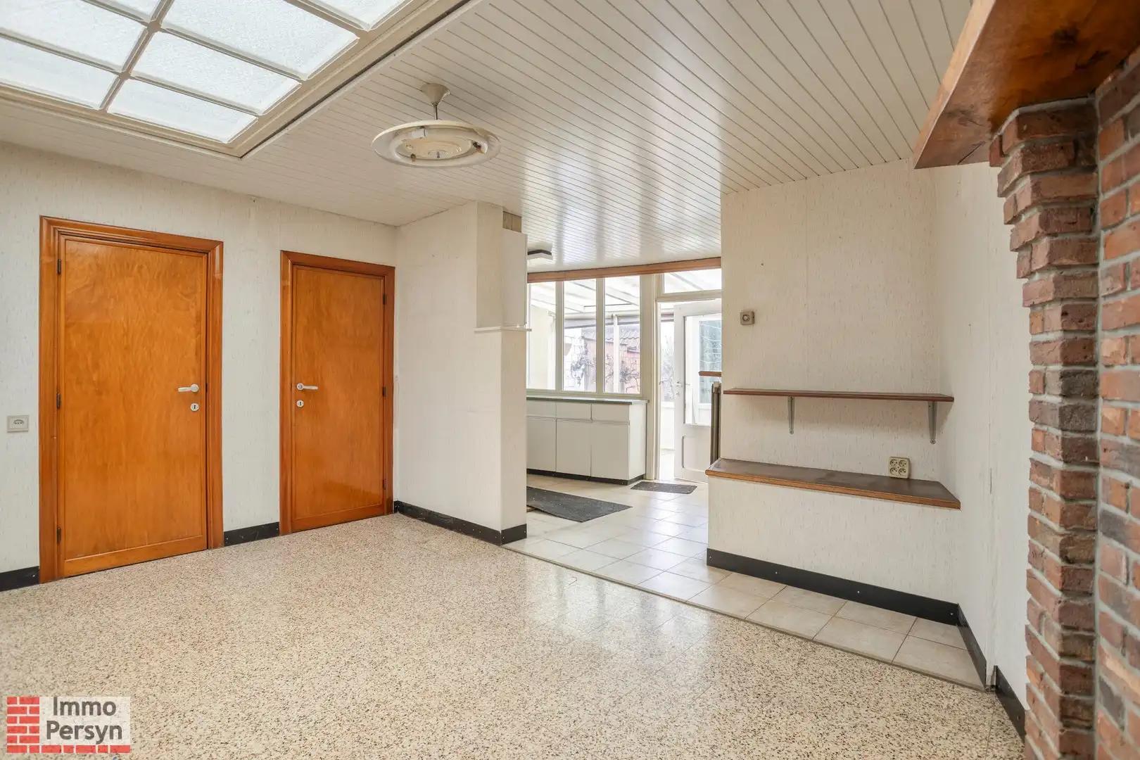 Te renoveren woning met 3 (mogelijks 4) slaapkamers en tuin met uitweg foto 5