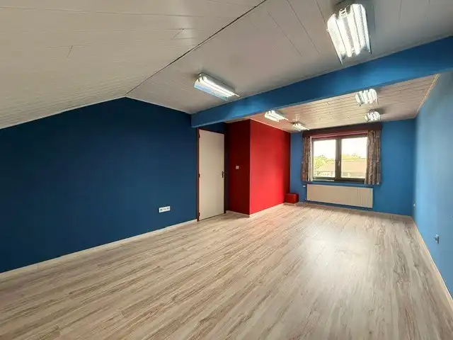 Halfopen woning met 3 slaapkamers, inpandige garage en mooie tuin in Kleine Brogel. foto 19