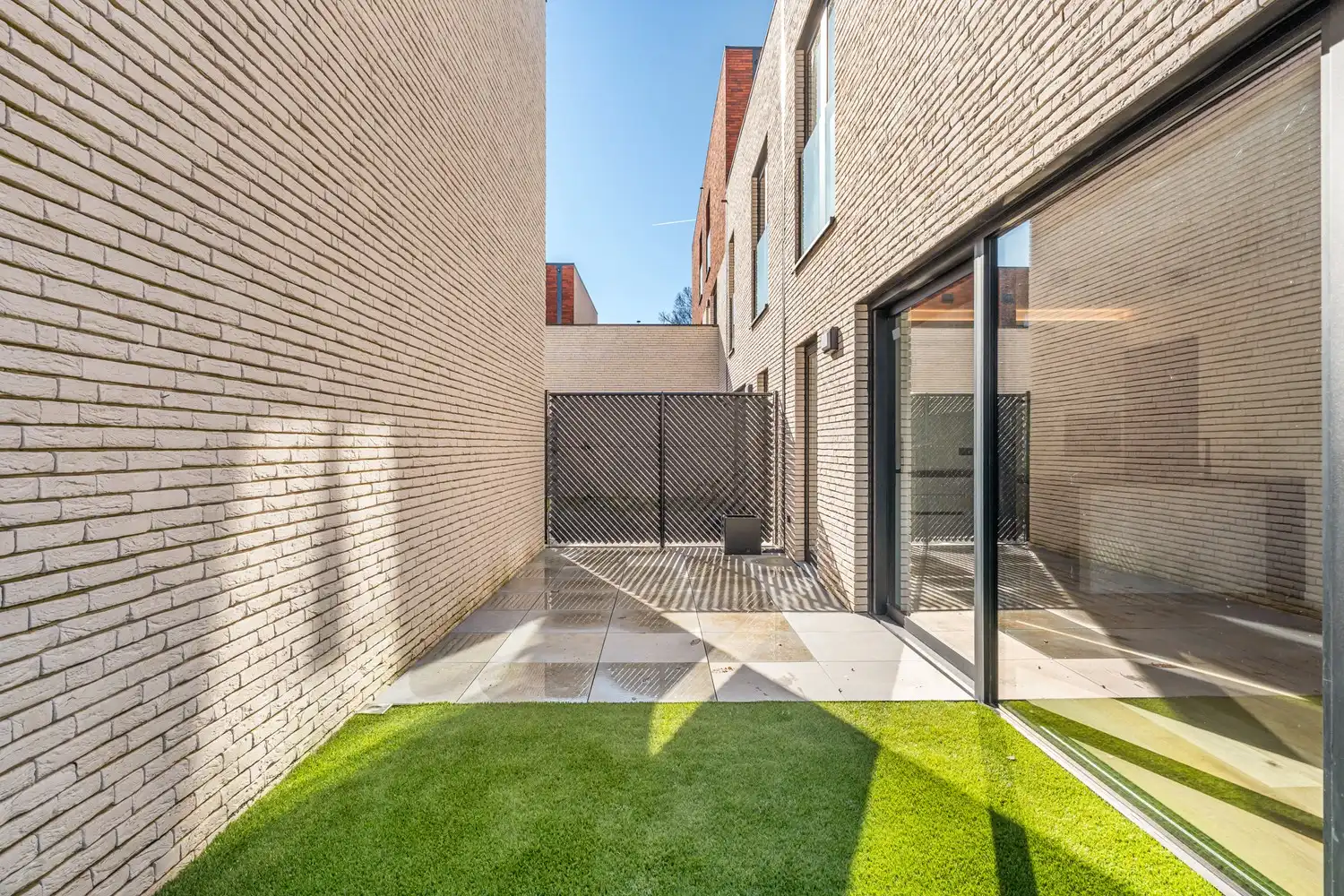 Instapklare nieuwbouw rijwoning met 3 slaapkamers en zonnig terras in het centrum van Borgloon foto 10