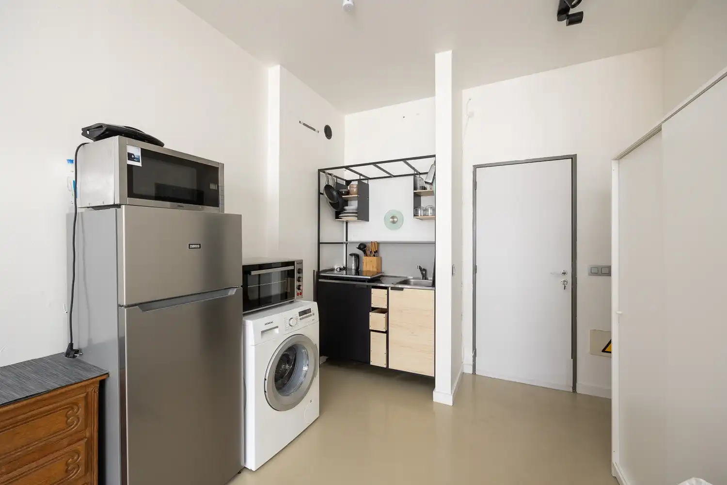 Instapklare en gemeubelde studio te koop in Antwerpen op de 7e verdieping van een verzorgd gebouw aan het Stadspark foto 8