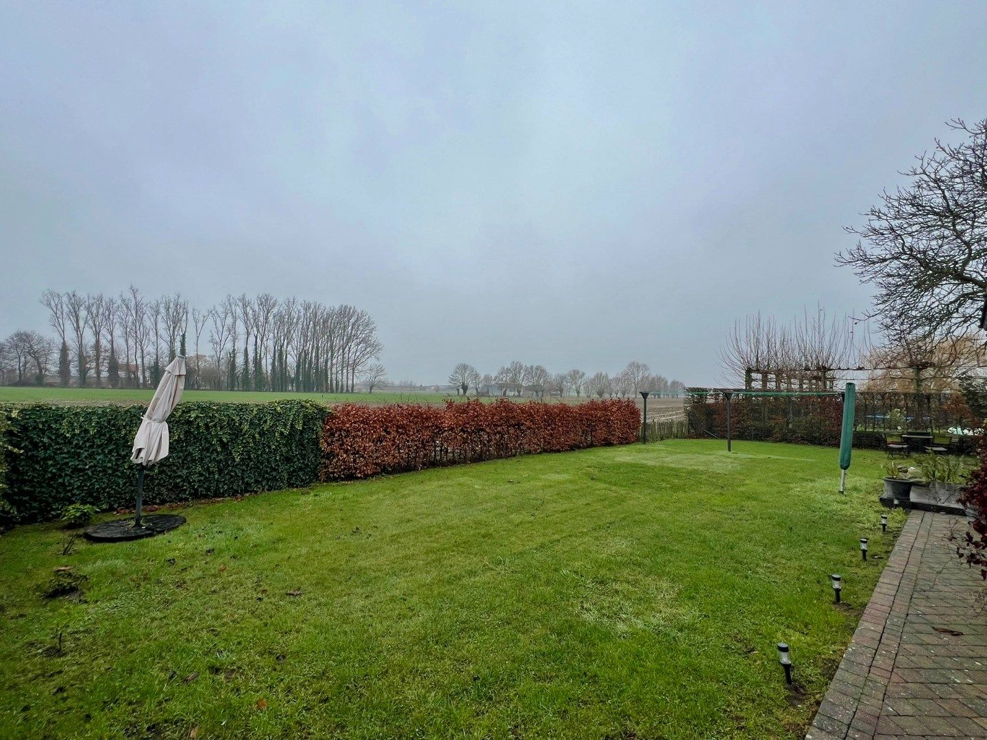 Charmante woning met zonnige tuin, prachtig zicht over de velden en garage  foto 14