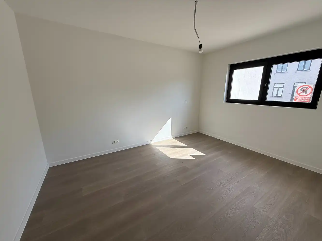 Ruim nieuwbouwappartement met 2 slaapkamers én parkeerplaats! foto 7