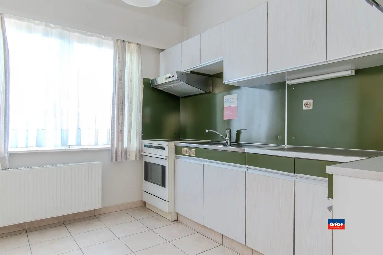 Deels te renoveren bel-étage met 3 slpks, garage + tuin foto 10