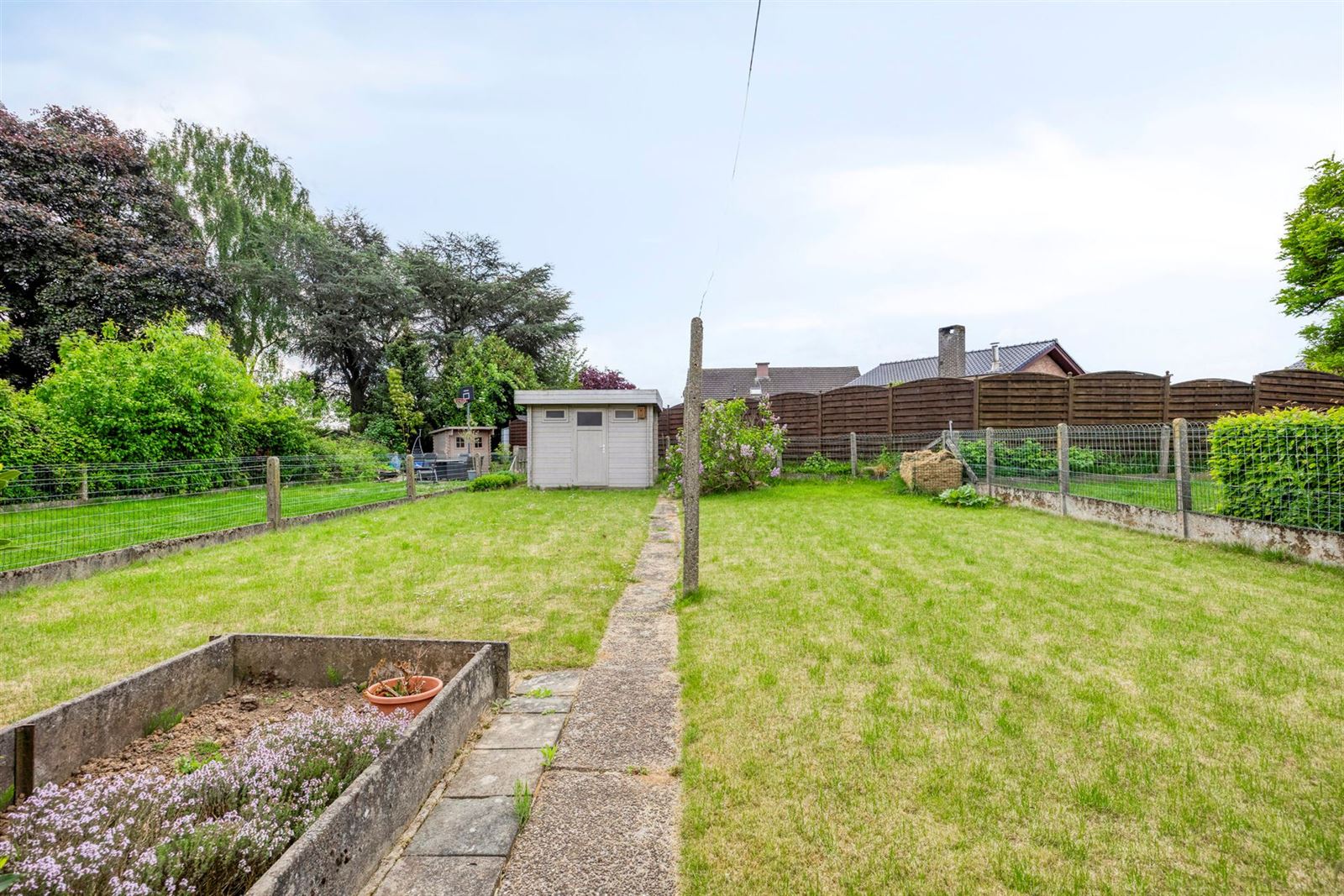 Ruime en zeer goed onderhouden 3-gevelwoning (EPC C) met garage foto 29