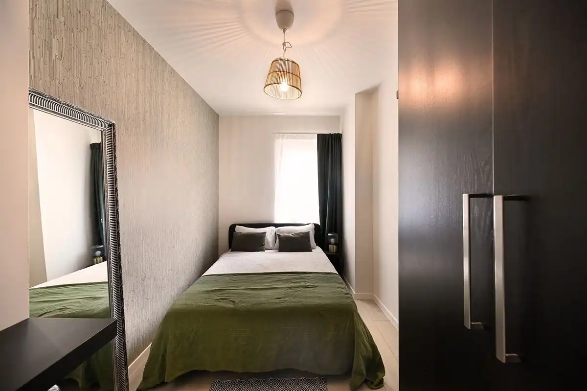 Instapklaar gelijkvloersappartement met heerlijke stadstuin foto 22
