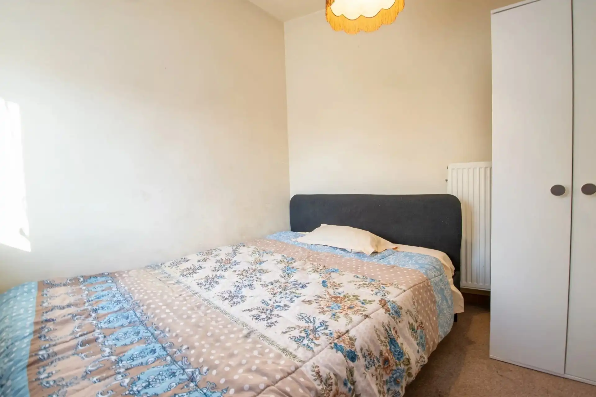 Instapklare bel-etagewoning met 2 slaapkamers en een ruime garage in het centrum van Sint-Gillis-Waas foto 10
