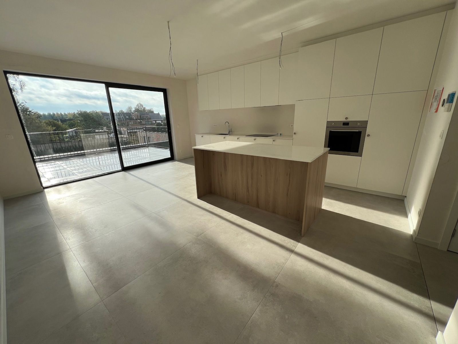 6% BTW - Duplex met 2 slpk, terras en bovengrondse parking foto 4