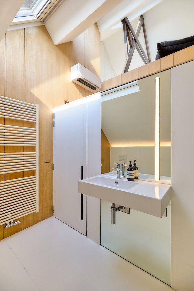 Buitengewone interbellum architecten-burgerwoning met tuin die omgevormd werd tot een hedendaagse luxueuze concept-woning. foto 37