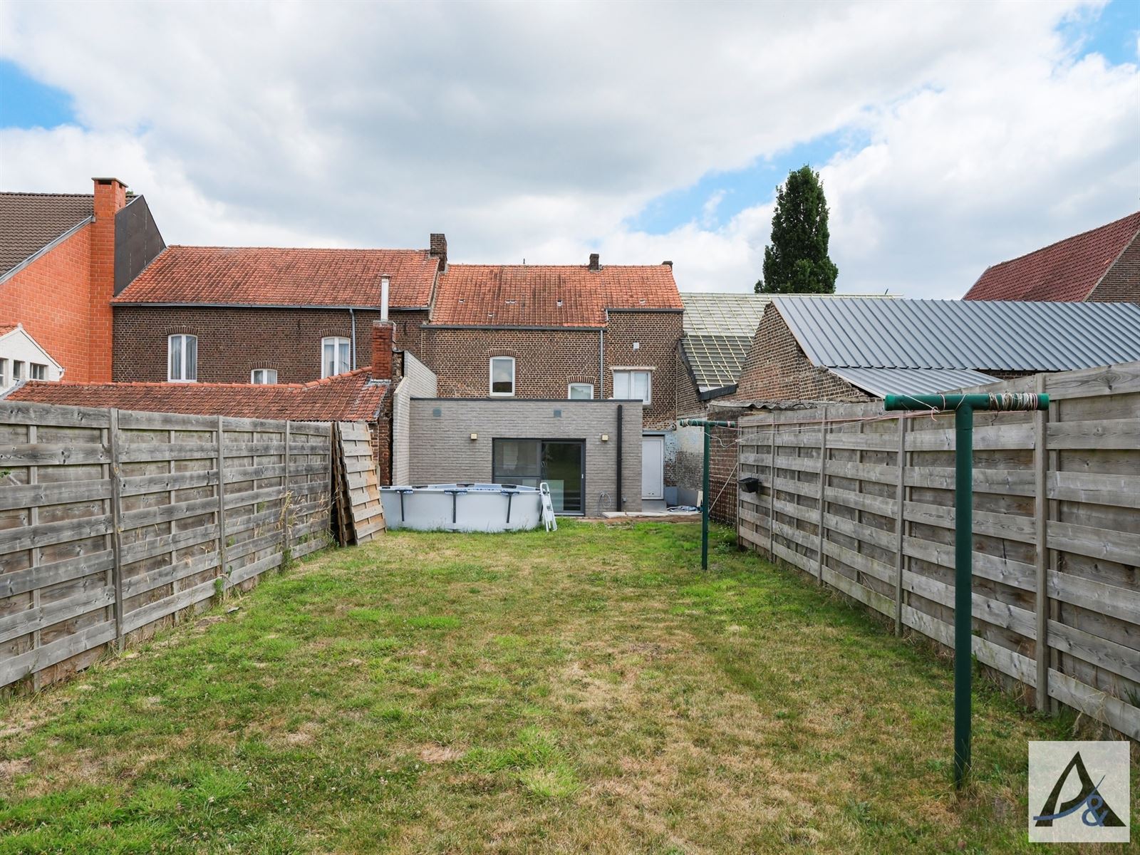 Instapklare gezinswoning met tuin en garage in hartje Munsterbilzen foto 7