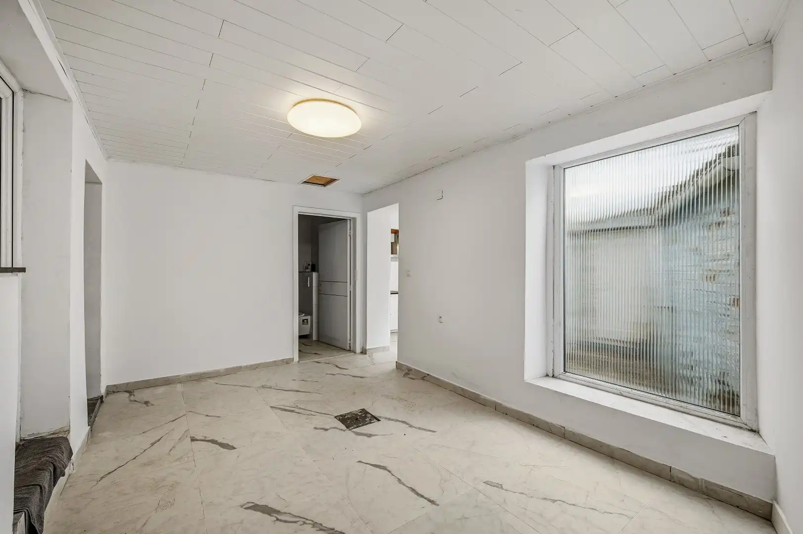 Gezellige rijwoning met 3 slpks op de Tiense stadsrand foto 13