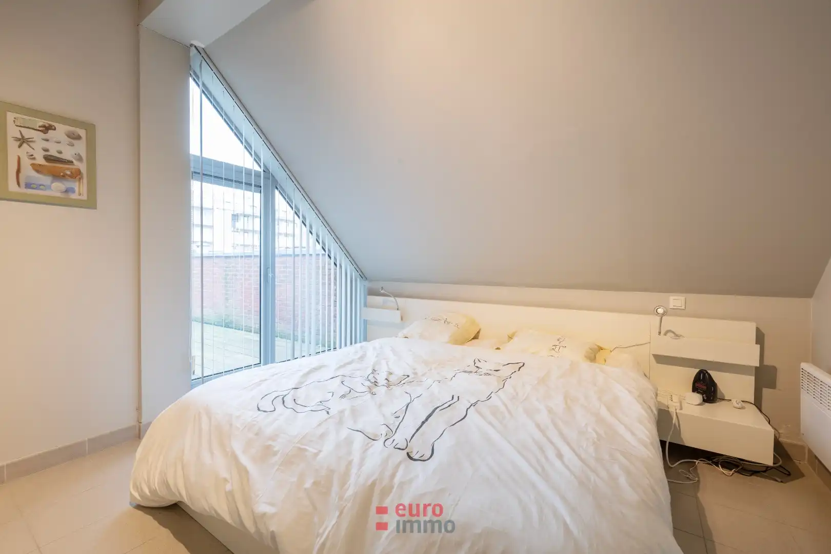 Uitermate lichtrijke penthouse midden in de winkelstraat! foto 9