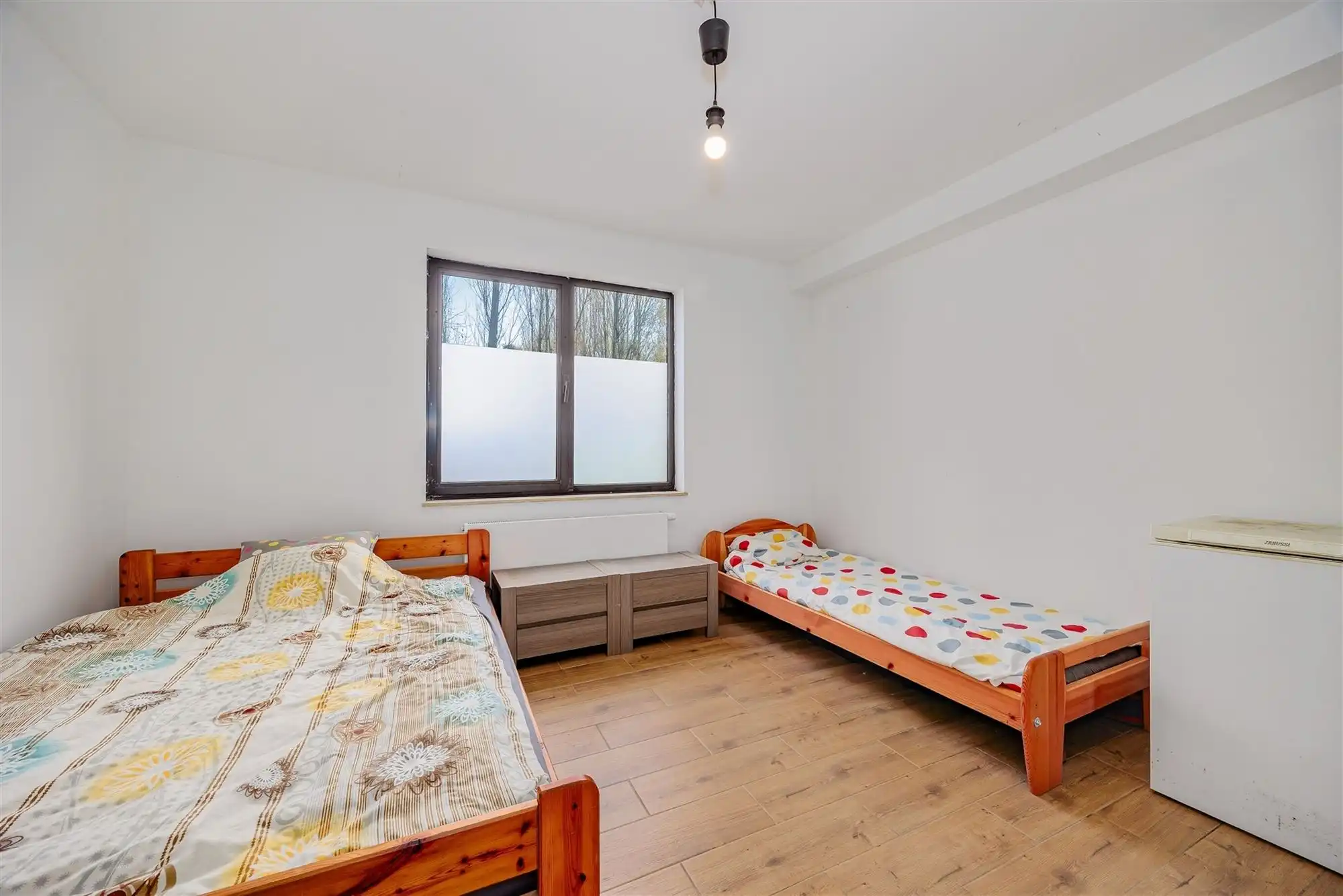 Instapklaar 2 slaapkamer appartement met gezellige tuin foto 10