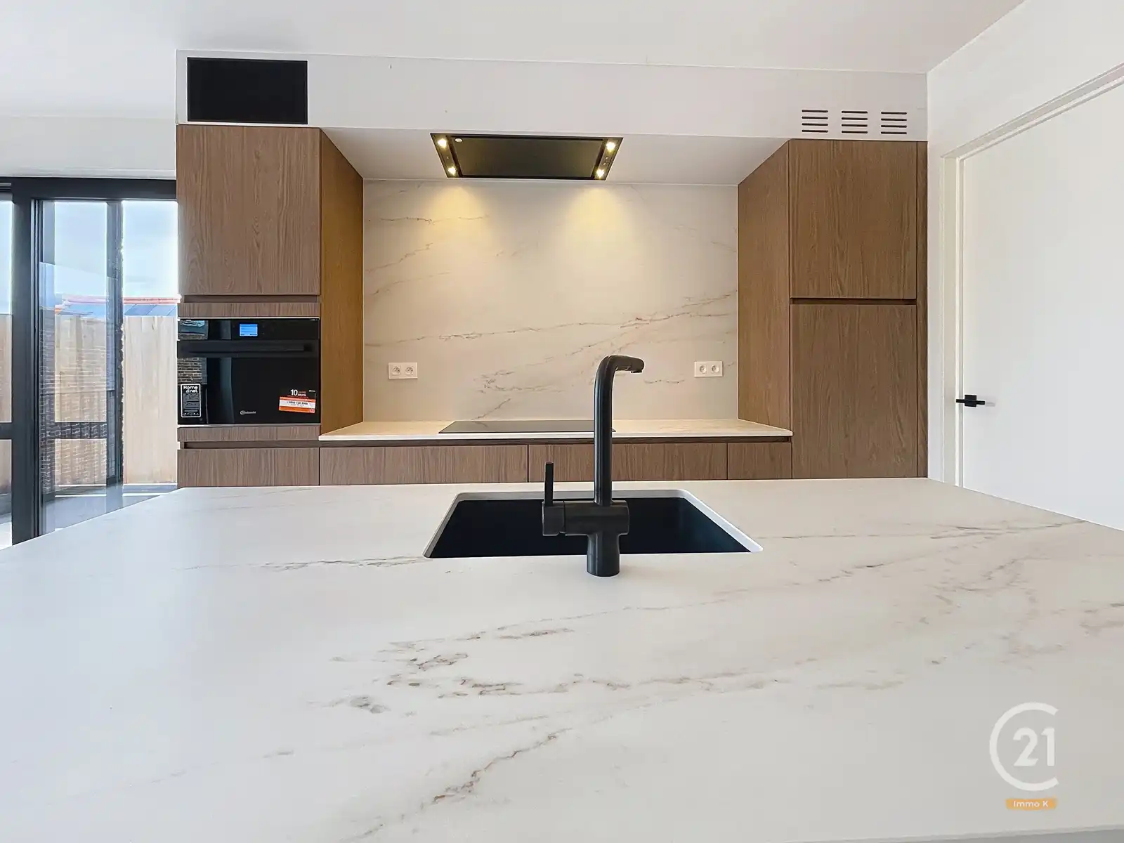 Nieuwbouw duplex met 4 slpks, terras, tuin en staanplaats foto 3