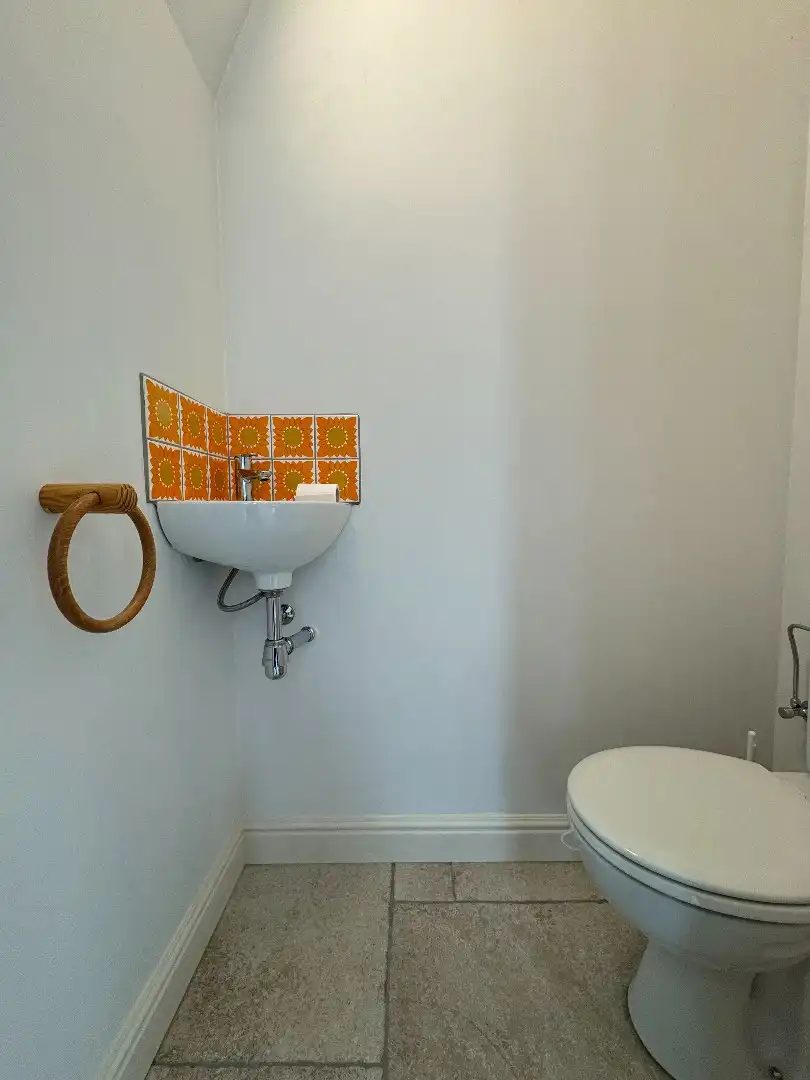 Een 4-gevelwoning met garage en  tuin foto 13