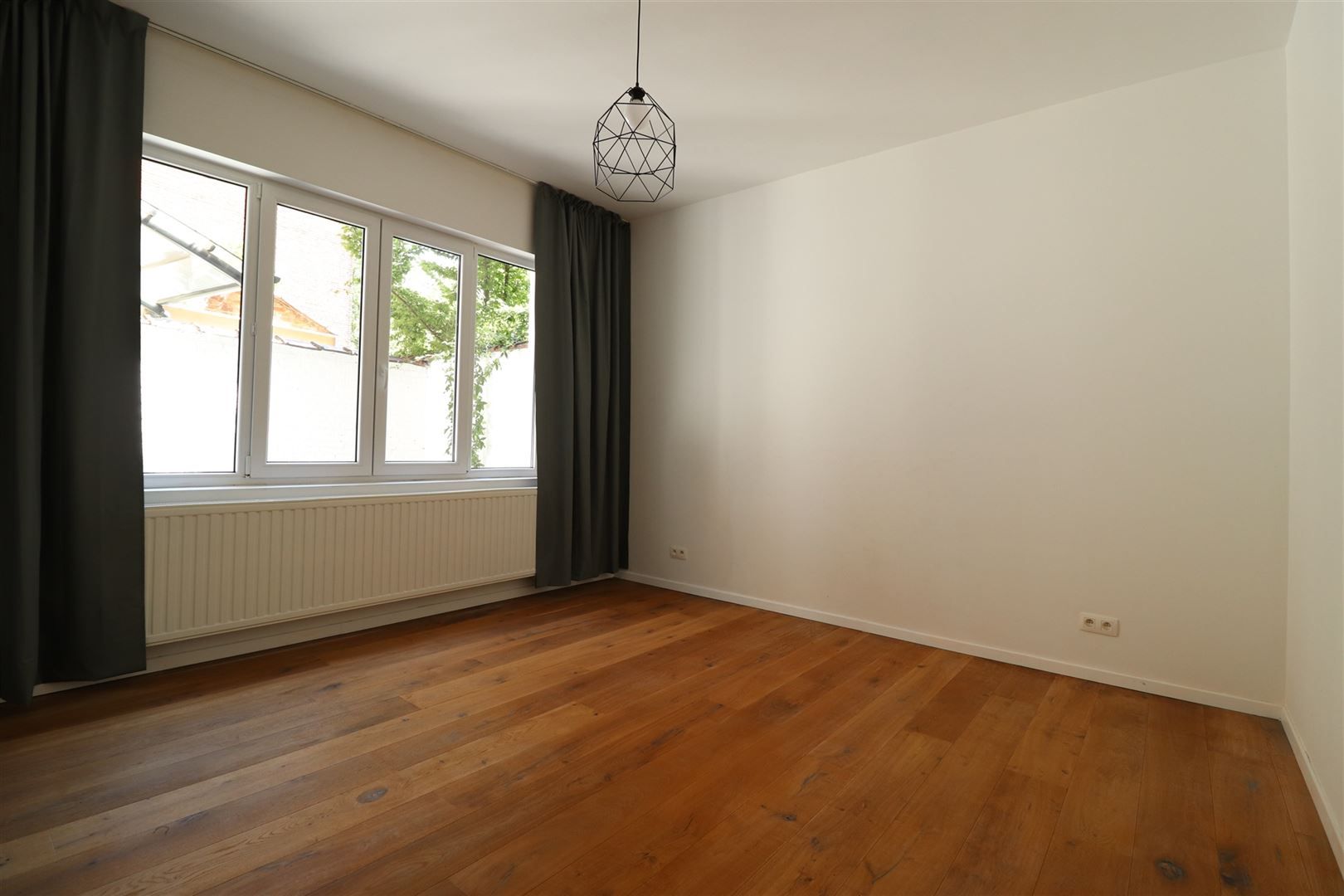 Gerenoveerd gelijkvloers appartement met terras foto 5