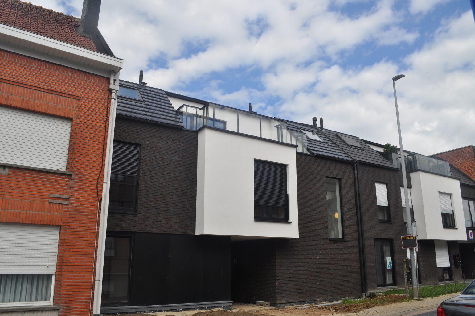 Nieuwbouw duplex-appartement te huur in Opwijk centrum! foto 2