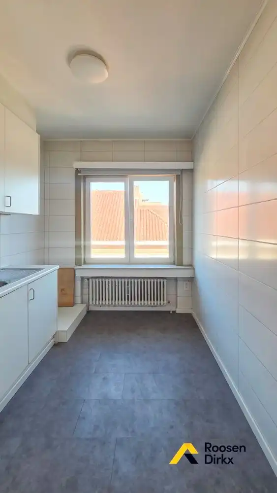Appartement (95m²) met 2 slaapkamers in hartje Bree foto 6