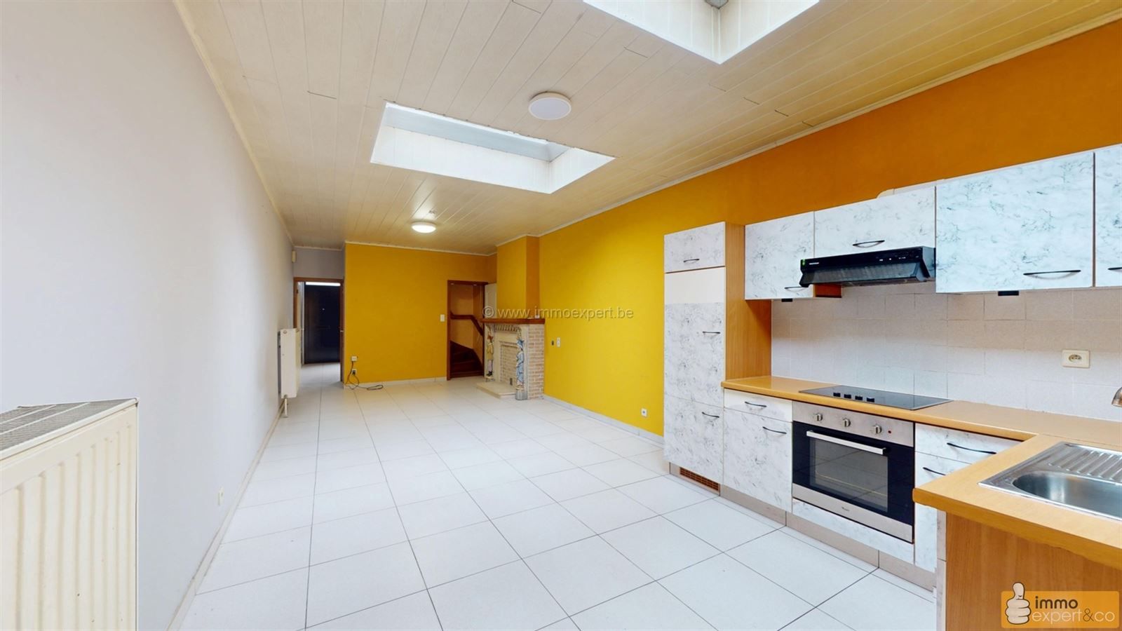 NINOVE: Centraal gelegen woning met 2 slpks, garage en koer foto 5