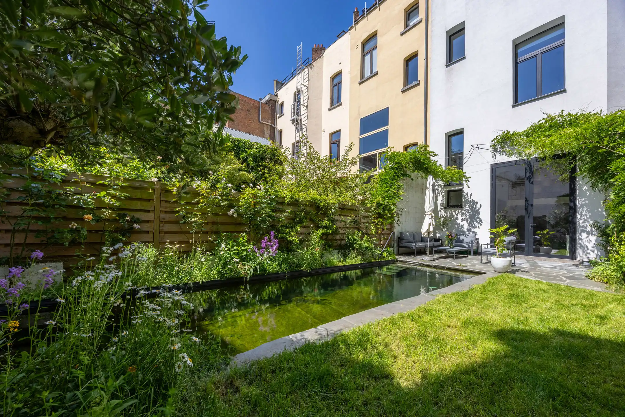 Uniek herenhuis met zwemvijver aan het Zuidpark foto 28