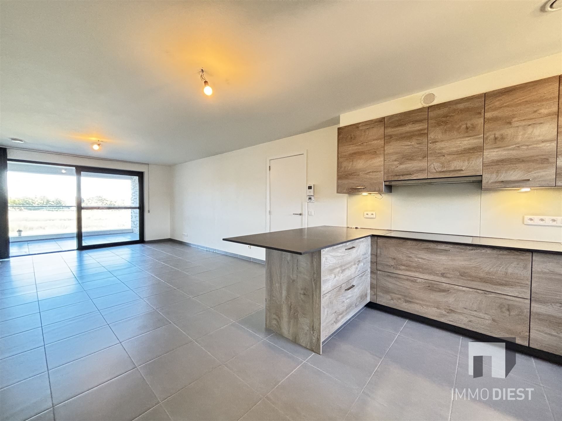 Ruim appartement op de tweede verdieping in het centrum van Tessenderlo foto 4