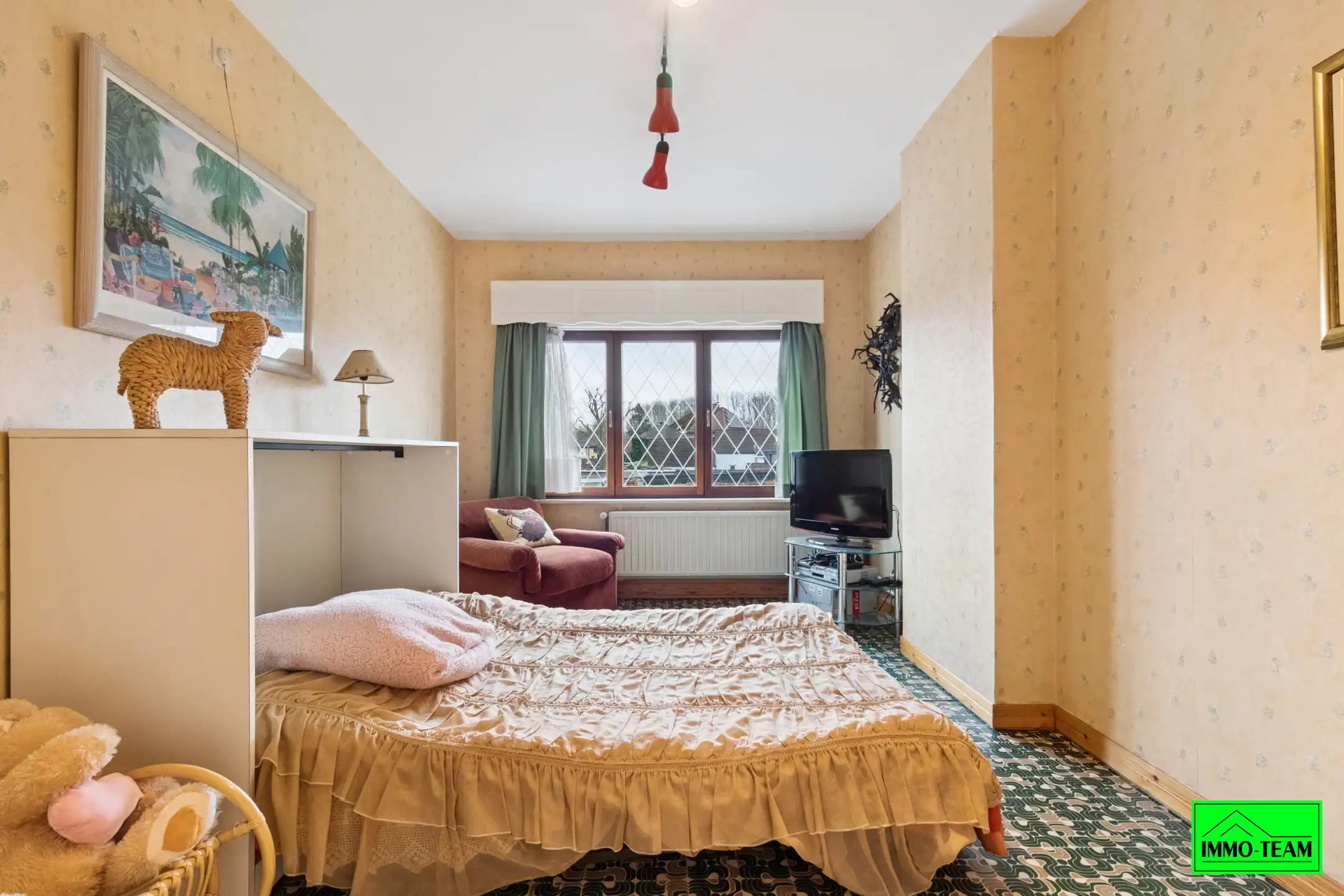 Goed onderhouden 3-gevelwoning met 3 slks, tuin en garage foto 10