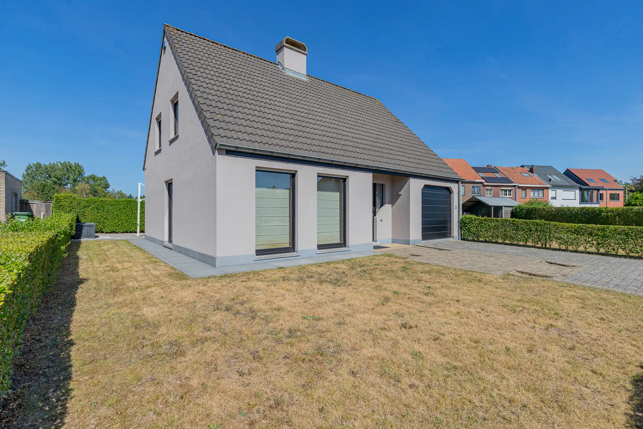 Hoofdfoto van de publicatie: HAALTERT - open bebouwing met 3 slpks, tuin en garage!