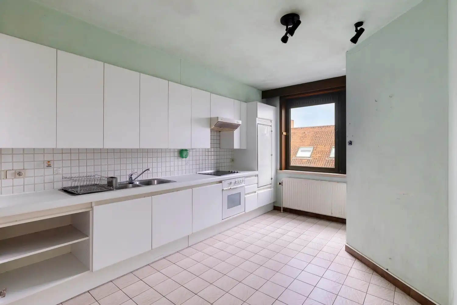 Functioneel en zonnig te renoveren appartement met drie slaapkamers en groot terras foto 8