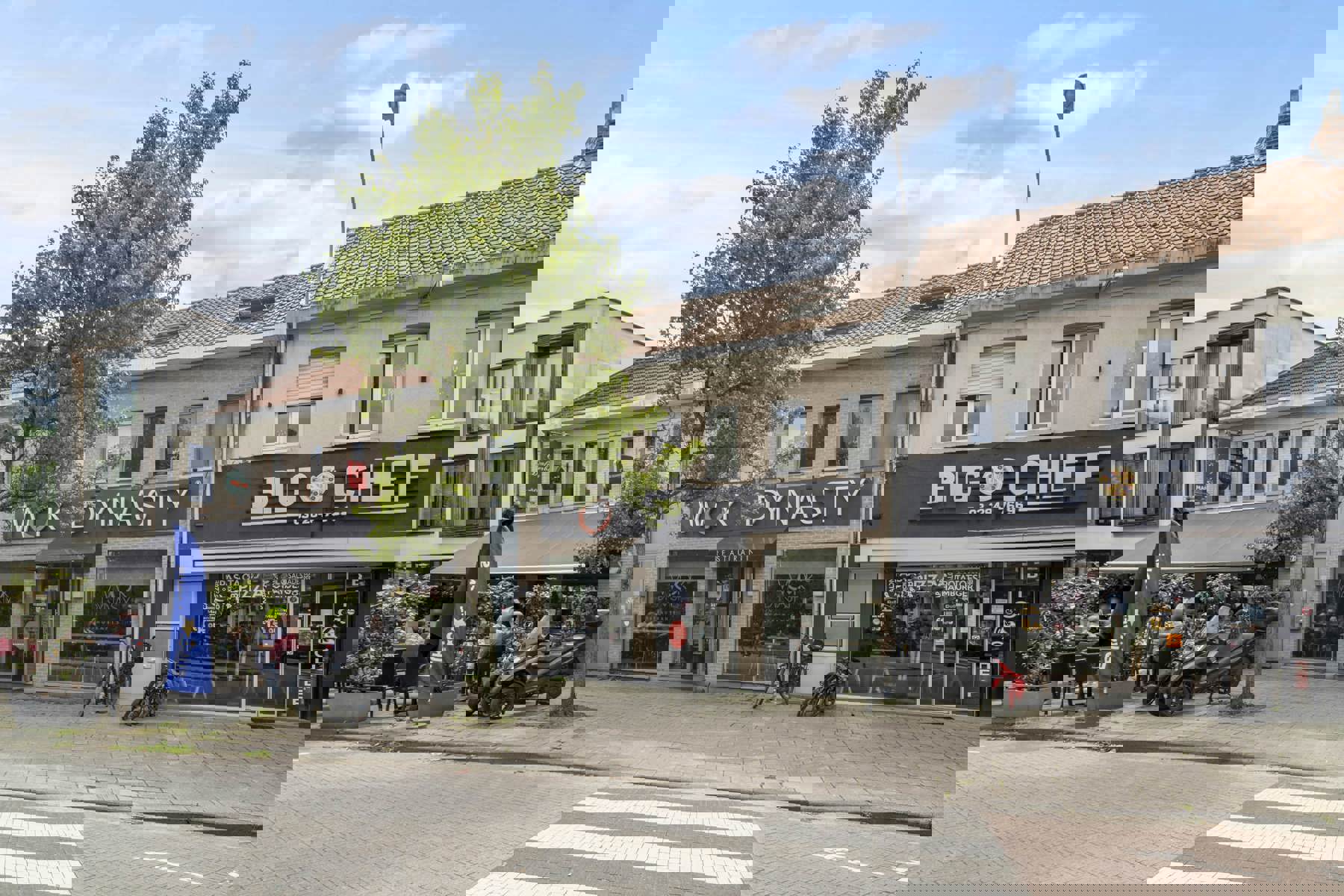 Prachtig commercieel pand met stadstuin in het hart van Aartselaar foto {{pictureIndex}}