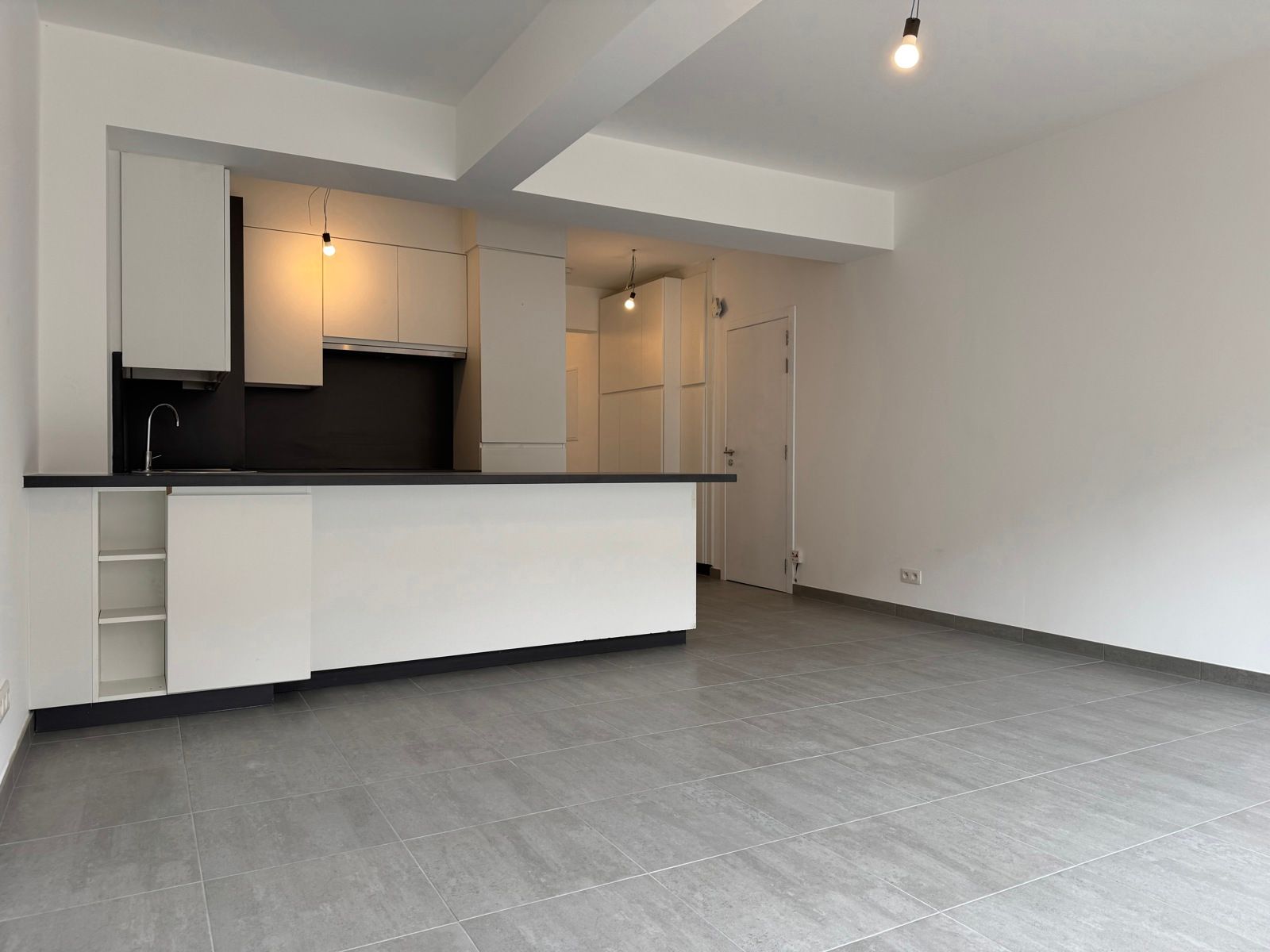 Te huur: gerenoveerd gelijkvloers appartement met tuintje foto 5