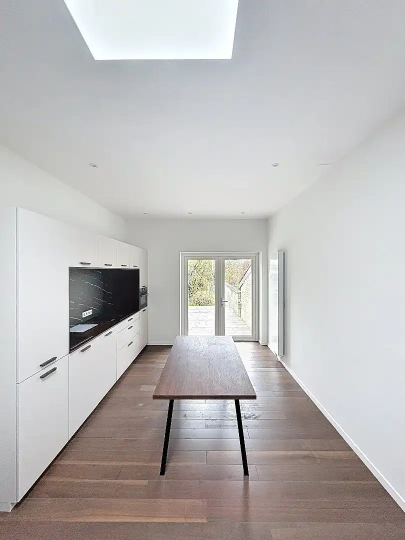 Elegant wonen in Tienen: gerenoveerde rijwoning met 3 slaapkamers en zuidwestgerichte tuin. foto 8