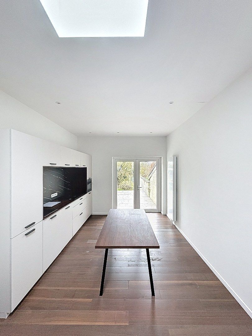Elegant wonen in Tienen: gerenoveerde rijwoning met 3 slaapkamers en zuidwestgerichte tuin. foto 8