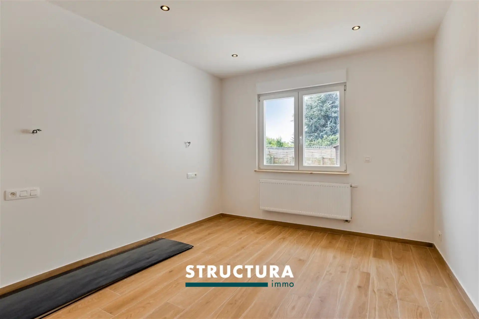 Instapklare gerenoveerde woning met zuidwestgerichte tuin foto 14