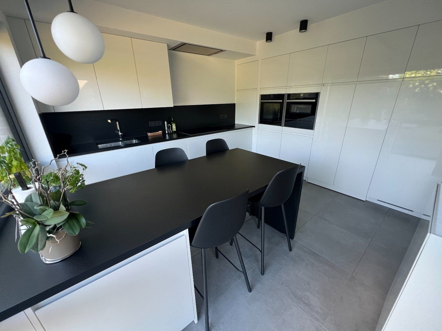 Prachtige moderne woning op toplocatie met 4 slpks, garage, tuin en terras foto 7