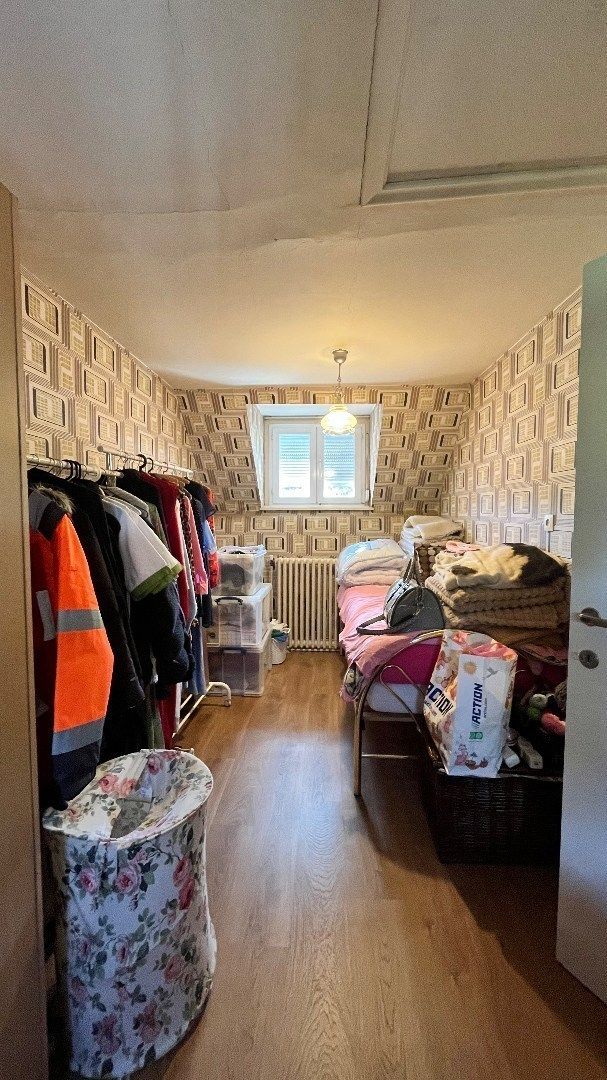 Grote woning met mogelijks vier kamers, garage en ruime tuin foto 17