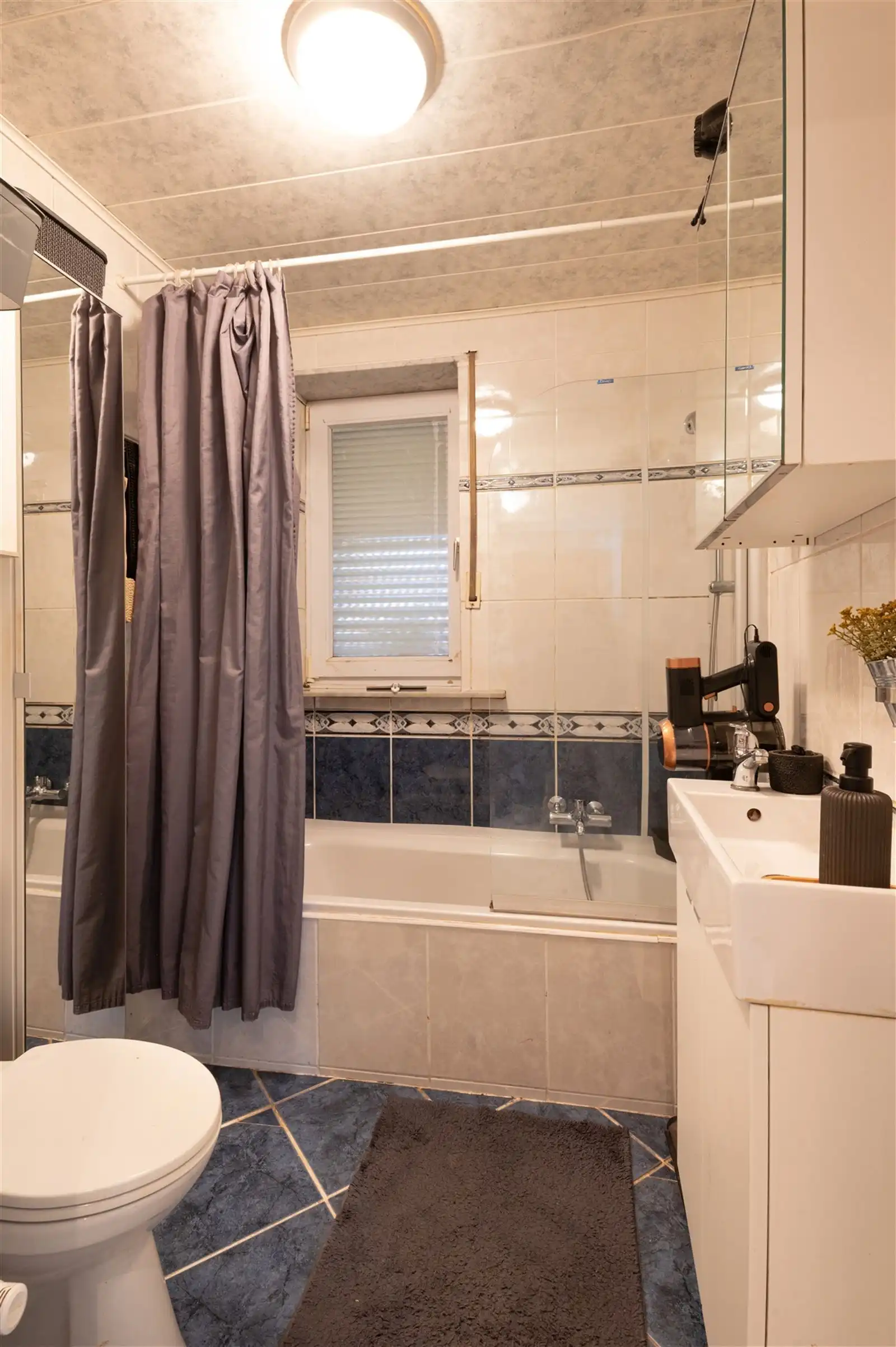 Gelijkvloers app met 2 slpks en garage foto 13