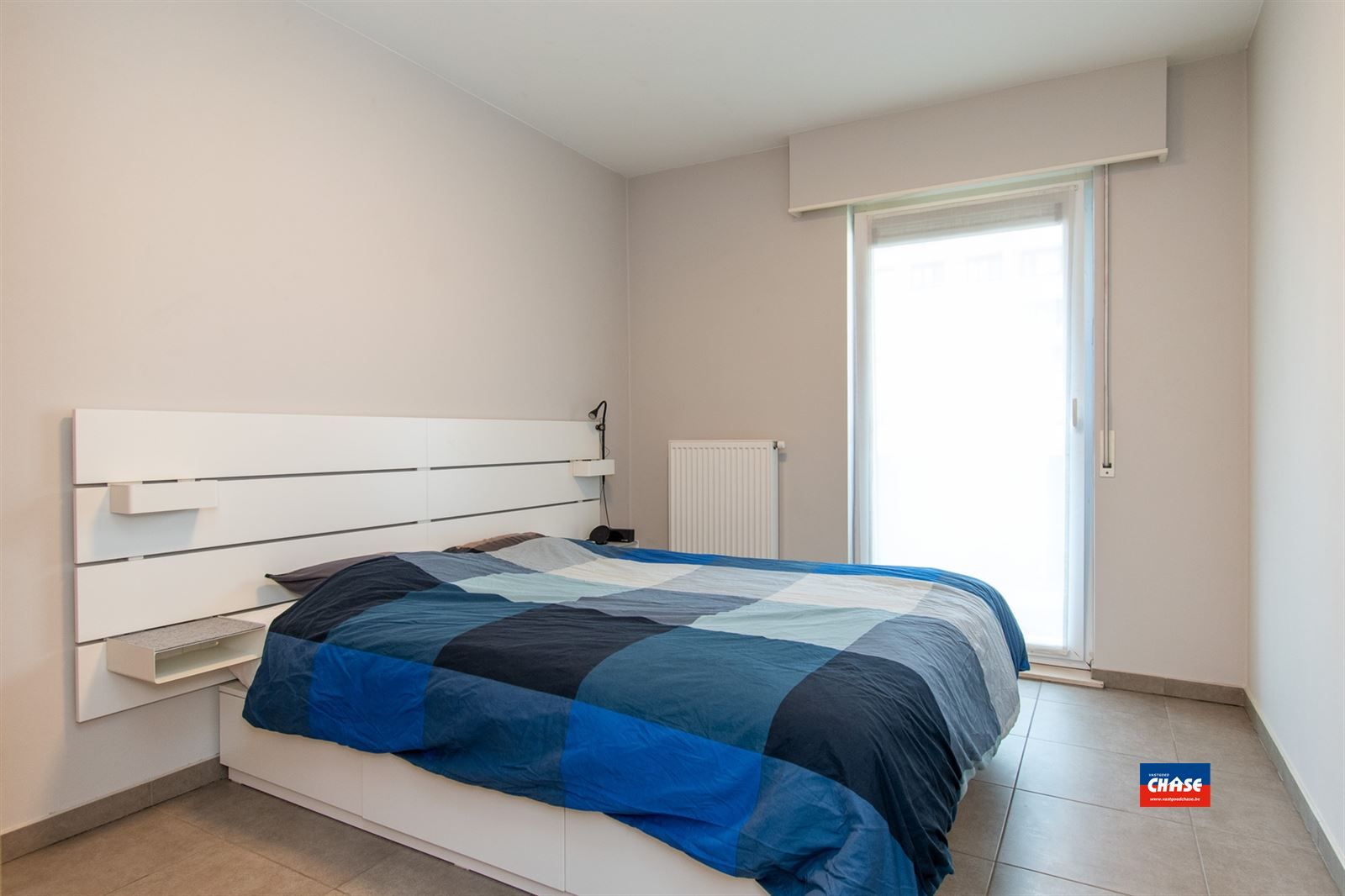 Ruim instapklaar appartement met 2 slaapkamers + terras + P foto 11