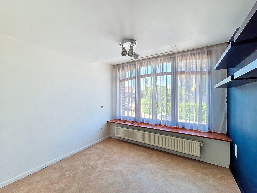 Ruime en energiezuinige wooneenheid met tuin foto 9
