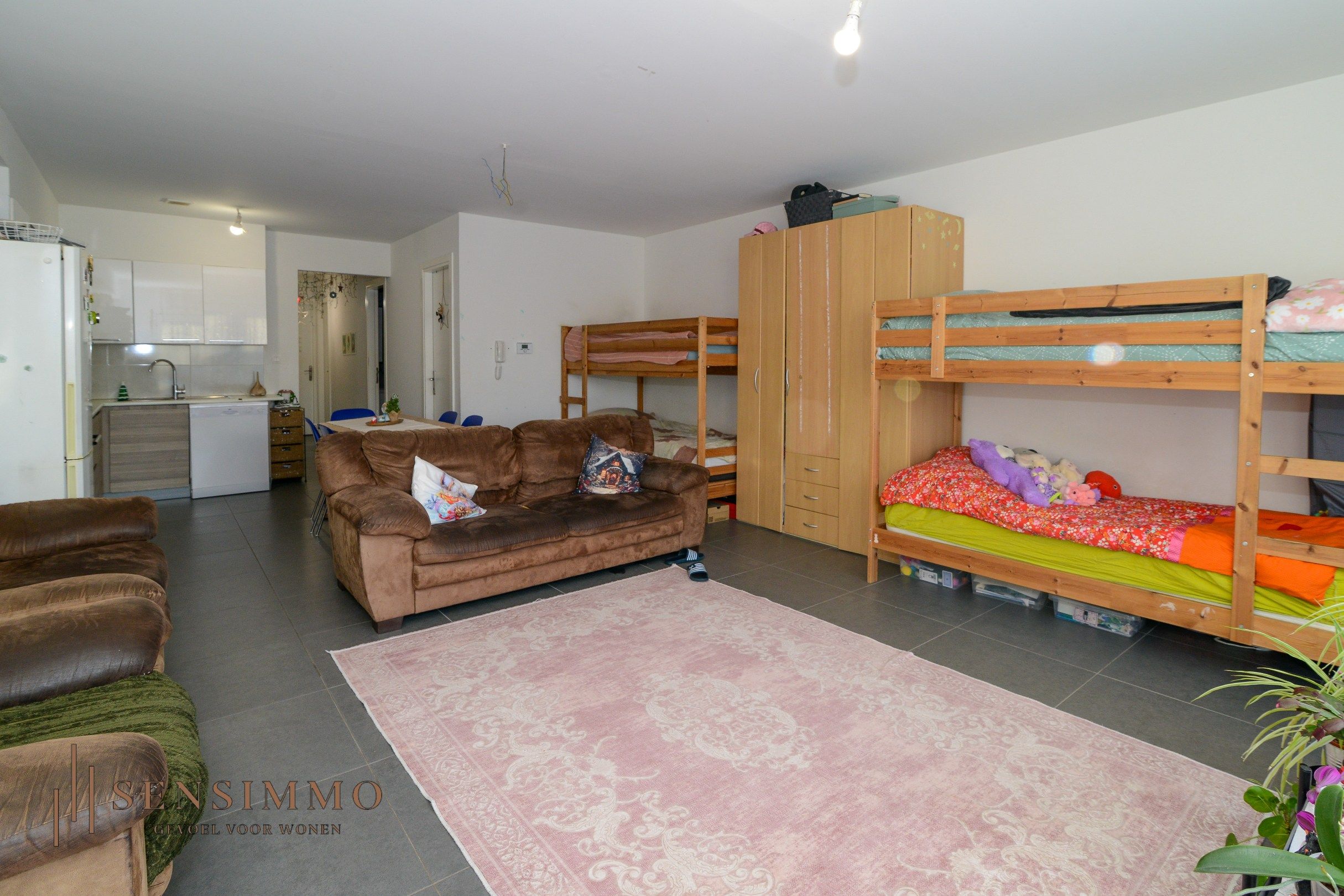 Gelijkvloers éénslaapkamer appartement met tuin, parking en kelderberging foto 6