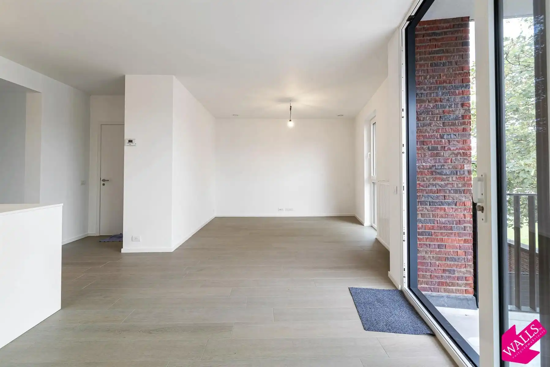 Energiezuinig appartement met 2 slk, terras en P nabij Boekenbergpark foto 5