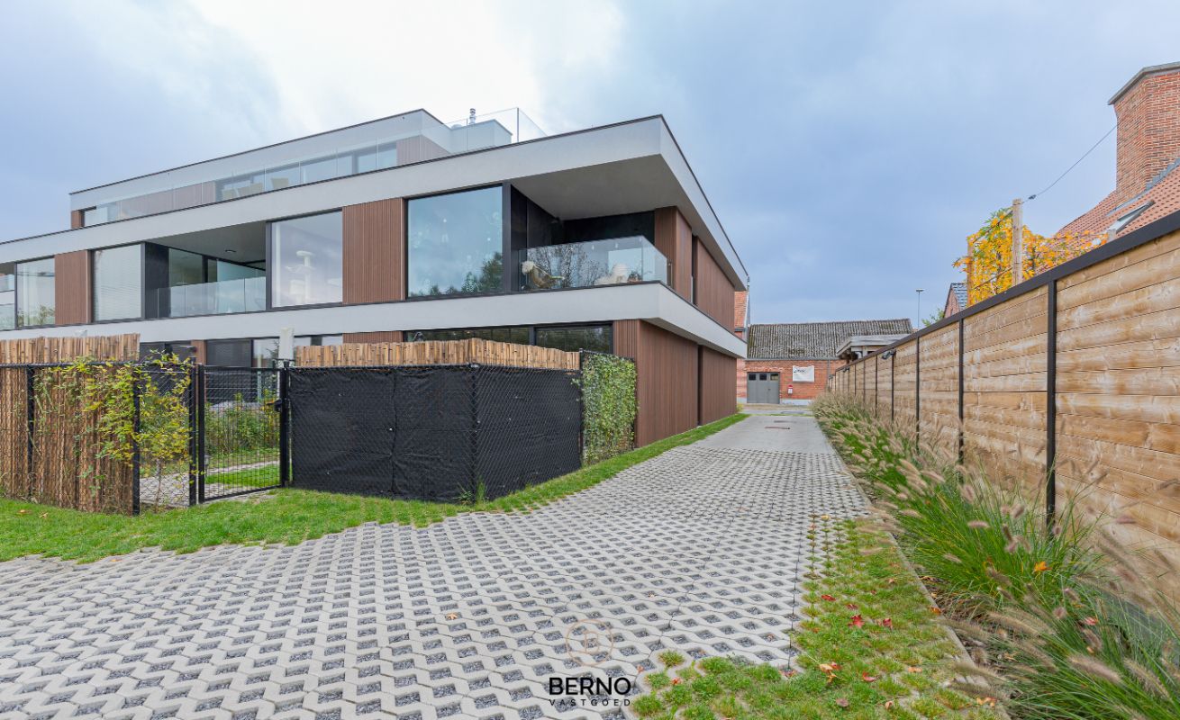 Recent gelijkvloers appartement met zonnig terras en tuintje in Opstal foto 18