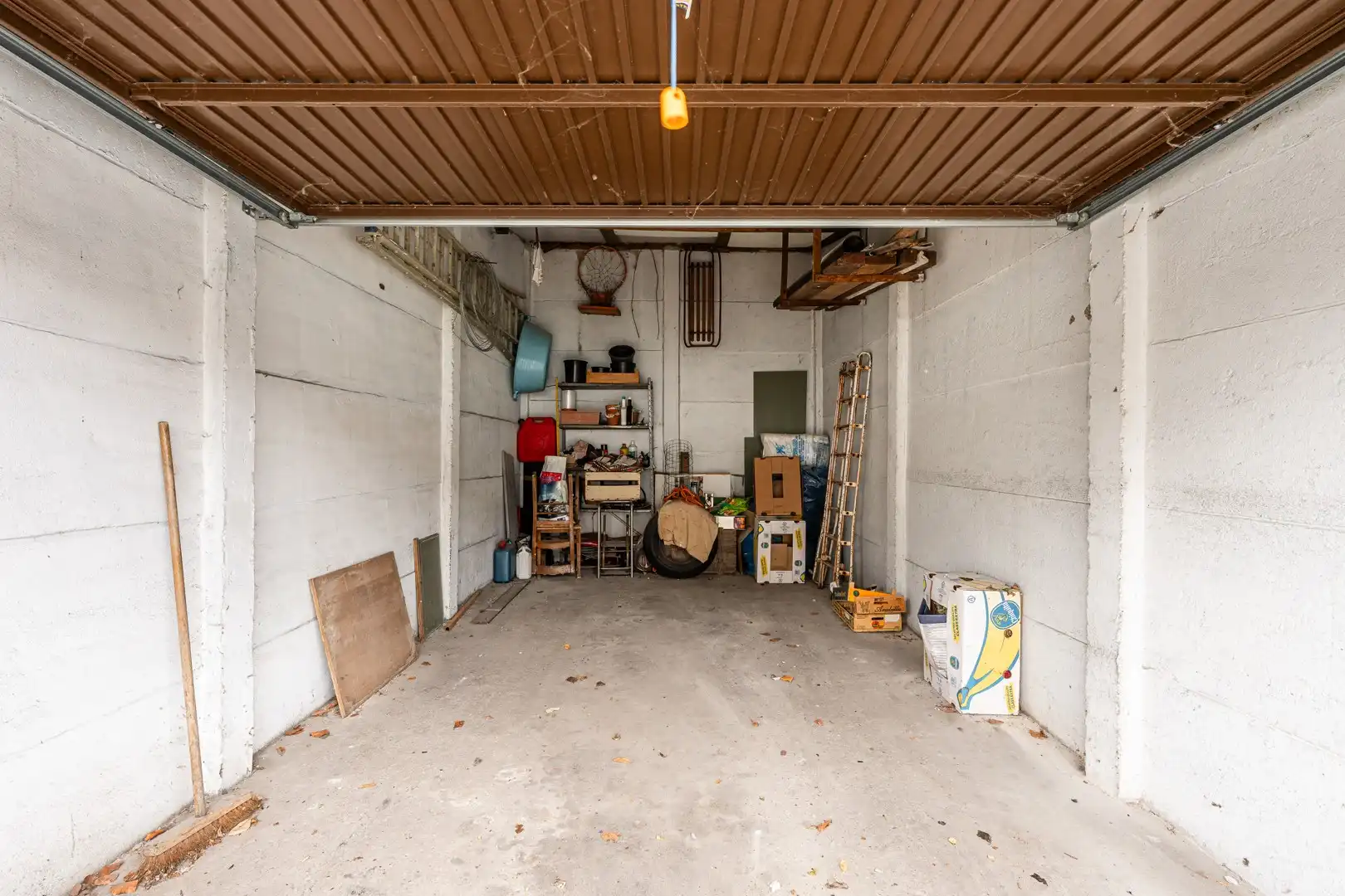 Te renoveren woning met verrassend veel ruimte, stadstuin en garagebox in Eeklo! foto 18