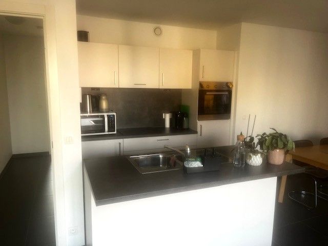 2 slaapkamer appartement met garagebox in ondergrondse parkeergarage foto 4